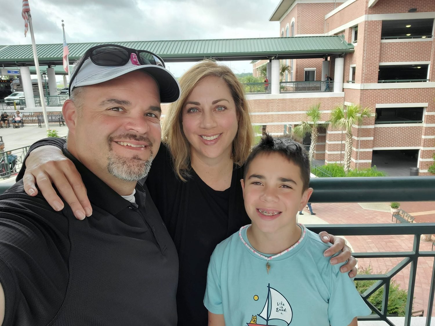 Jim Cripps with his wife and son