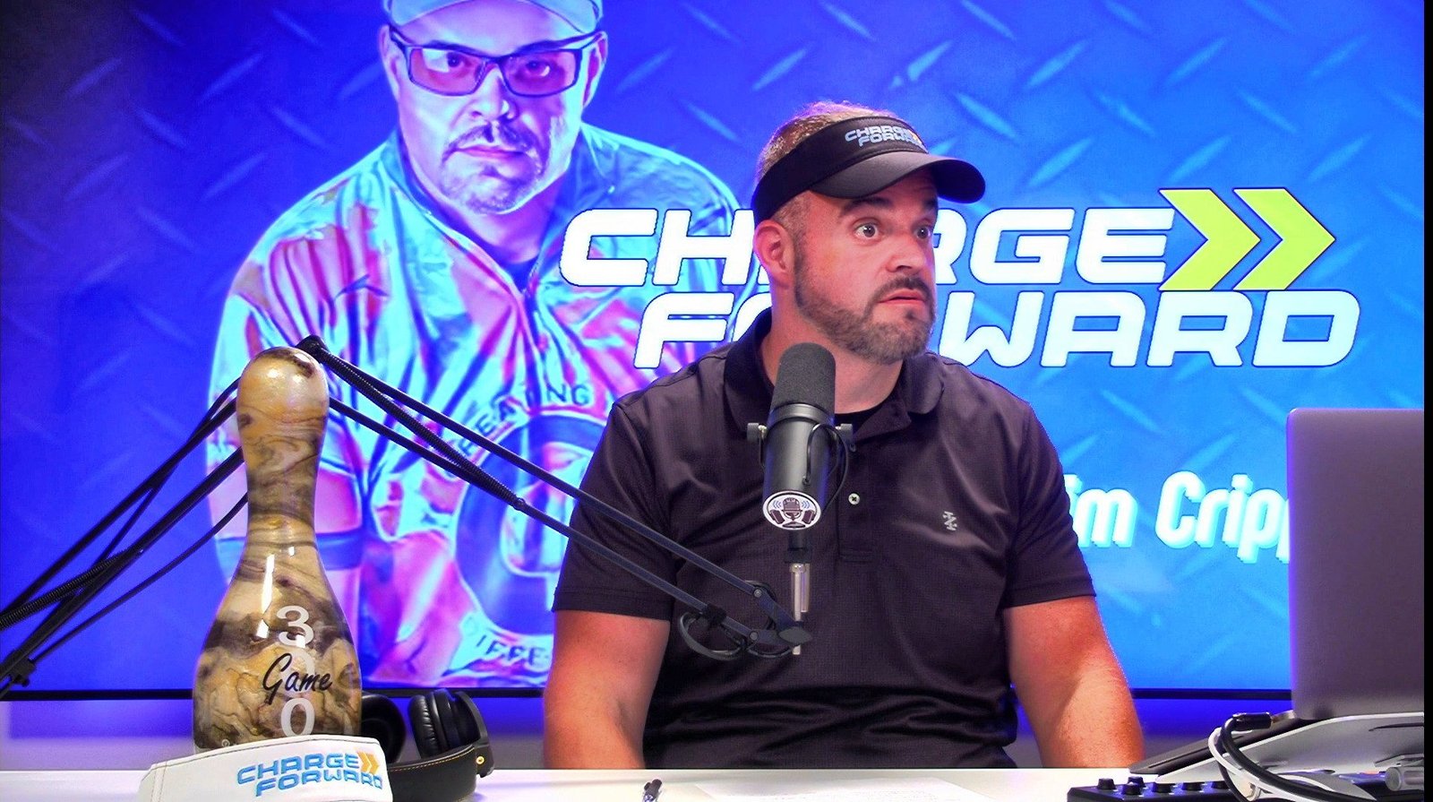 Jim Cripps hosting the Charge Forward Podcast in the studio